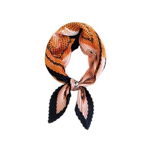Pleated paisley square scarf in orange and black with elegant polka dots and chain pattern