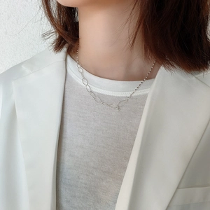 Minimalist 925 sterling silver olive bead necklace worn on model for a sleek look