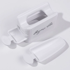 Detailed view of white plastic double-layer dipping powder recycling box for French manicures