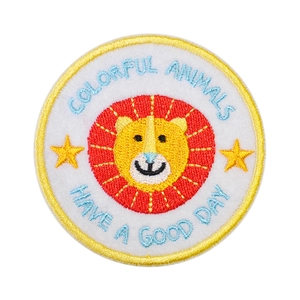 Round cartoon lion embroidered patch with colorful stars and animal theme for DIY crafts