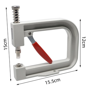 Manual watch case press tool with red handle grip and height measurements in cm