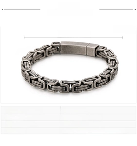 Detail of black Byzantine link chain in stainless steel with measurement markings