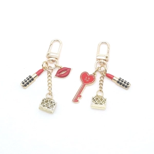 Chic red lipstick and heart charms gold keychain for women's fashion accessories