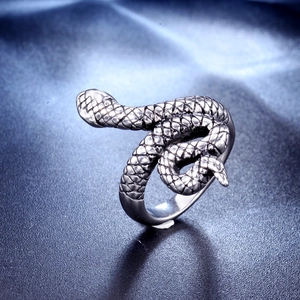 Vintage stainless steel snake head ring with detailed scales and an antique silver finish