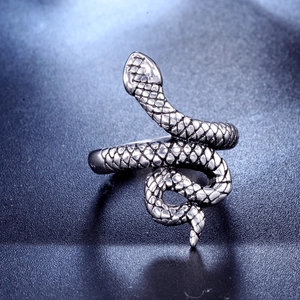 Vintage stainless steel snake head ring with detailed scales in a gothic punk style