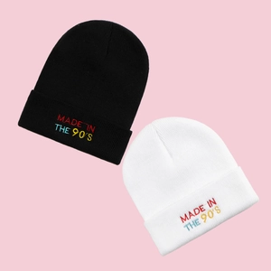 Winter knitted beanies in black and white with MADE IN THE 90'S colorful embroidery