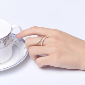Adjustable golden bypass ring with micro-paved cubic zirconia stones for women
