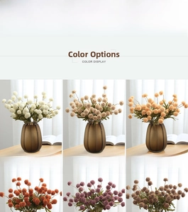 Close-up of five-head artificial dandelion pompons in multiple colors for home decor