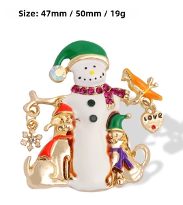 Detail of enamel snowman brooch with dog, cat, snowflake and love heart charms