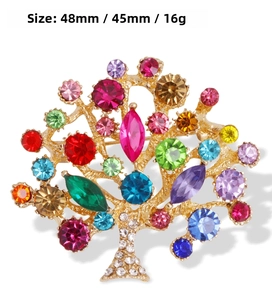 Detail view of colorful rhinestone tree brooch with gold metal base and dimensions