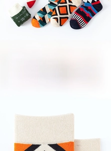 Detailed view of geometric knit socks with physical formulas and ribbed cuff texture