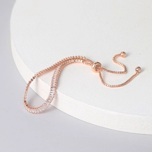 Rose gold adjustable tennis bracelet with rectangular clear cubic zirconia stones