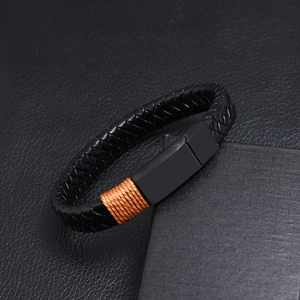 Vintage black braided leather bracelet with orange accents and a matte magnetic clasp