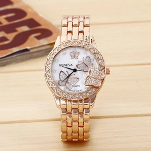 Detailed macro of a rose gold Geneva watch featuring diamond butterfly dial accents