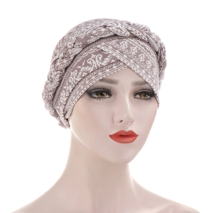 Women tie-dye turban hat with braided design in vintage ethnic geometric pattern