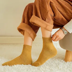 Women's warm thermal mustard yellow knit crew socks with thick fleece lining