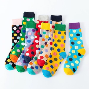 Colorful polka dot crew socks in cotton blend featuring vibrant patterns for men and women