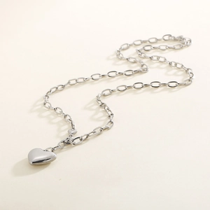 Elegant silver stainless steel heart pendant necklace with a classic link chain for women