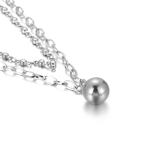 Minimalist double layer silver chain necklace featuring a smooth round ball pendant