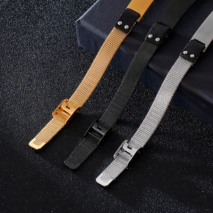 Macro detail of stainless steel mesh bracelets in gold, black, and silver finishes