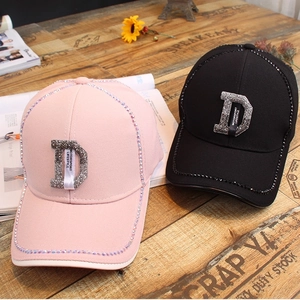 Fashionable baseball cap with hand-set rhinestones in pink and black for stylish sun protection