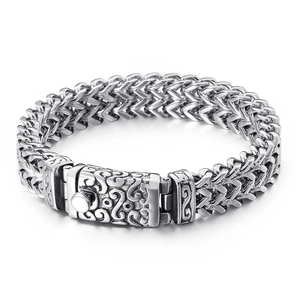 Men's punk titanium steel keel chain bracelet with silver engraved clasp on white backdrop