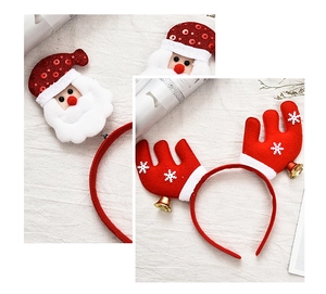 Detail of Christmas headbands with red sequins, white snowflakes and golden small bells