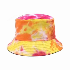 Detailed close-up showing vibrant tie-dye pattern and reinforced stitching on cotton bucket hat