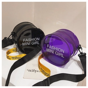 Detail of round mini jelly bags in black and purple with fashion mini girl prints