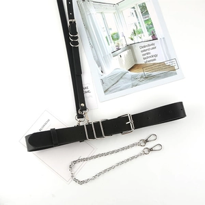 Punk black leather belt with silver rings and detachable metal chain over white background