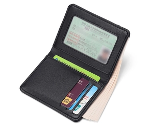 Slim black leather card holder with multiple slots and a clear ID window for driver license
