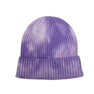 Unisex tie-dye purple and white ribbed knit beanie with fold-over cuff on white background