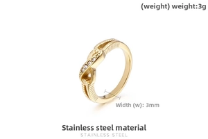 Detail of 3mm gold infinity twist ring in stainless steel with crystal accents
