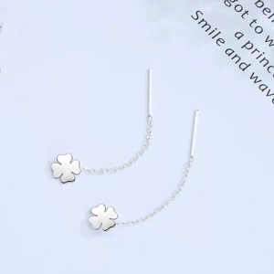 Detail showing S925 sterling silver hallmark and elegant four-leaf clover long chain earring