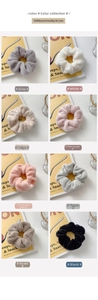 Detailed collection of plush scrunchies in eight colors displayed on yellow books