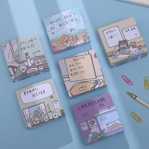 Flat lay of six mini cartoon memo pads in various cute designs with colorful stationery