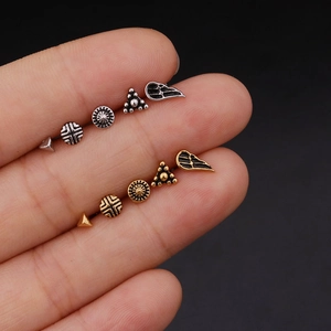 Miniature vintage style stainless steel stud earrings in silver and gold wing shapes
