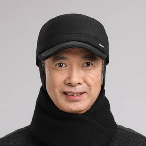 Detail of men's winter flat cap with ear flaps and matching black scarf set