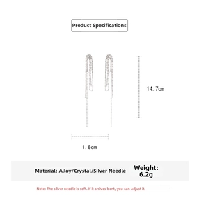 Detailed view of silver tassel earrings showing 14.7cm length and alloy rhinestone material