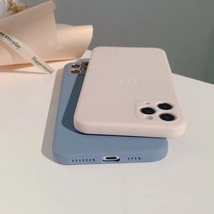 Detailed view of pink and blue heart patterned matte silicone phone cases for iPhone