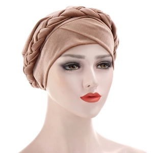 Front view detail of a light coffee velvet turban hat with a braided twist design