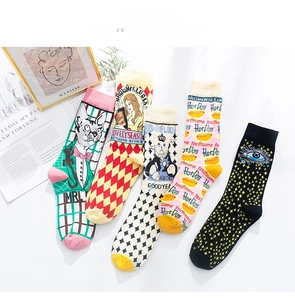 Detailed flat lay of five cotton mid-calf socks with artistic illustration patterns