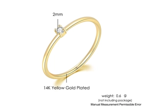 Detailed view of 14K gold plated ring with a 2mm round cubic zirconia in a 4-prong setting