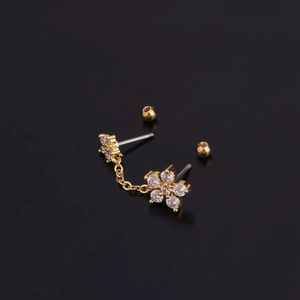 Detail of gold-plated flower earrings with colorful zircon and double piercing chain