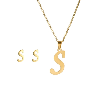 Detail view of gold stainless steel 'S' letter pendant necklace and matching earrings