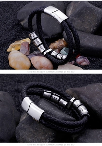 Close-up of double-wrap black braided leather bracelet with silver stainless steel clasp
