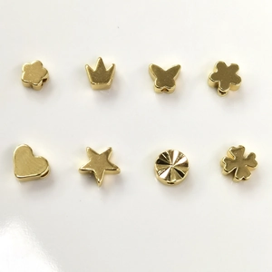 Assorted 14K gold filled charms including heart, star, and clover for DIY jewelry making