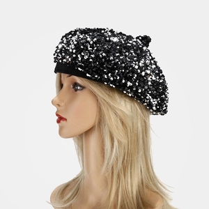 Detail view of the shimmering black and silver sequins on this trendy beret cap
