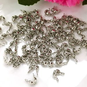 Silver 14k gold-filled wire protectors for DIY jewelry making on white background
