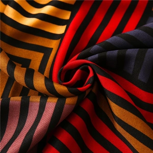 Detailed view of colorful striped linen cotton scarf with vibrant starry sky pattern